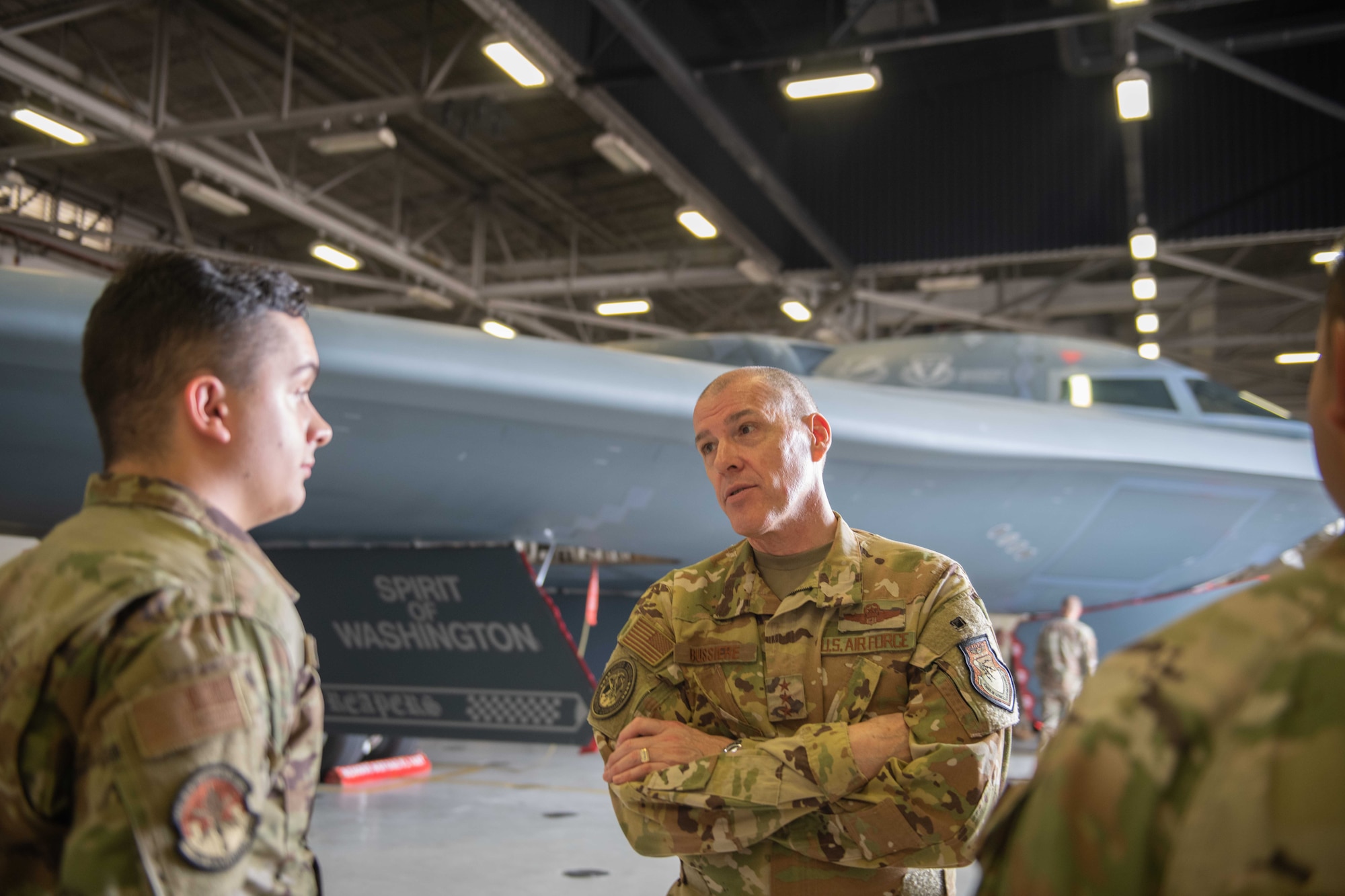 U.S. Air Force Lt. Gen. Thomas Bussiere, United States Strategic Command deputy commander, and U.S. Marine Corps Master Gunnery Sgt. Charles Baker, United States Strategic Command, Commandant, participate in a tour of the B-2 Spirit and talk to various Airmen across the 509th Bomb Wing Aug. 4, 2022, on Whiteman Air Force Base, Mo. Bussiere and Baker visited Whiteman Air Force Base to present the 509th Operations Support Squadron with, and congratulate them for winning, the 2021 Omaha Trophy. (U.S. Air Force photo by Airman 1st Class Bryson Britt)