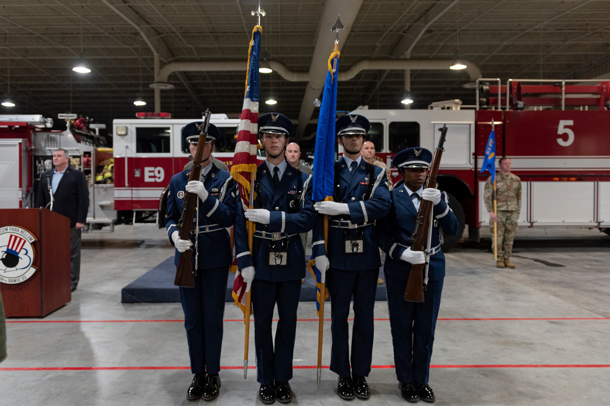 Photo of Honor Guard members preparing to present the colors
