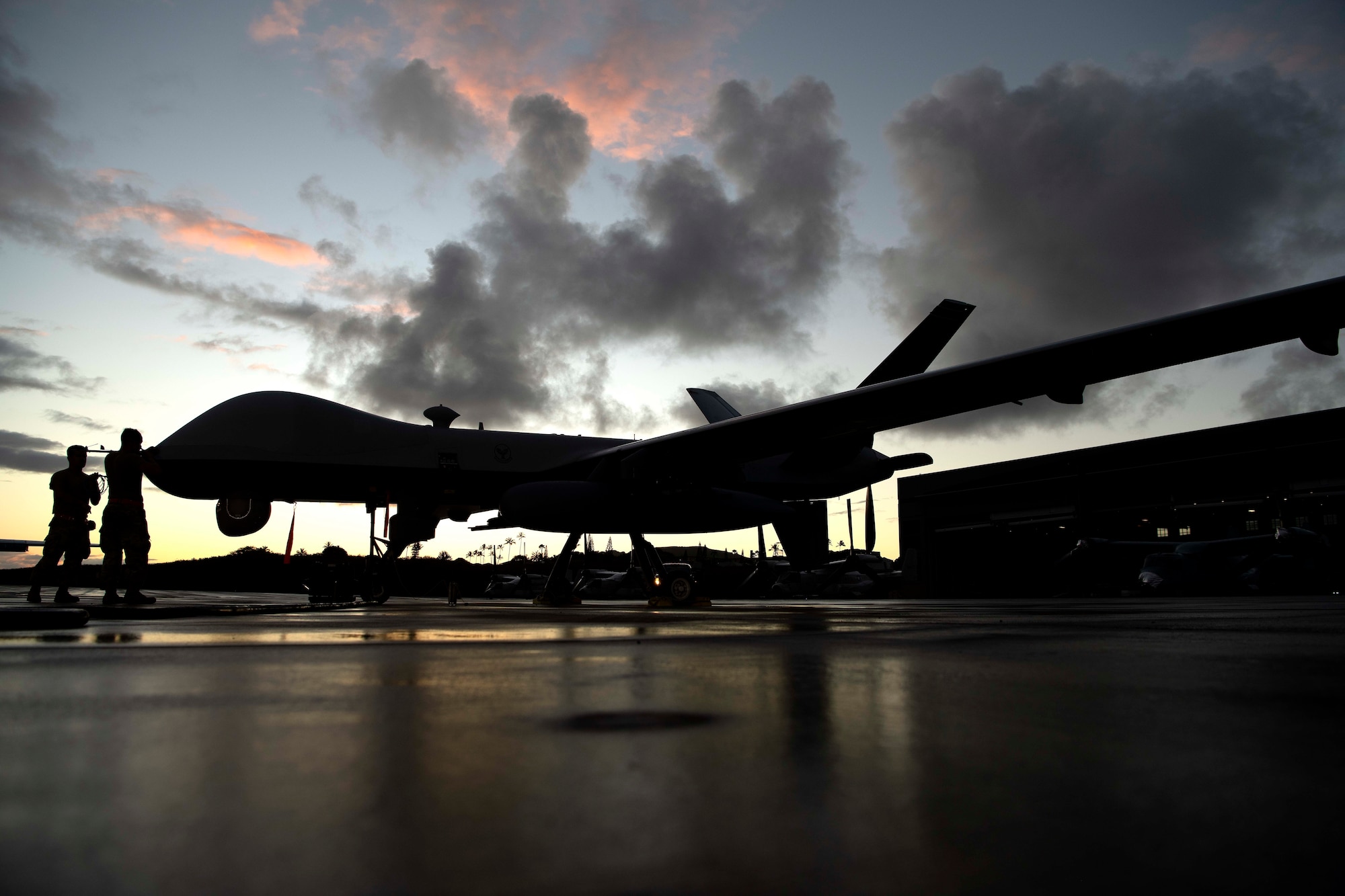 MARINE CORPS AIR STATION, KANEOHE BAY, Hawaii (July 25, 2022) U.S. Air Force Airmen from the 49th Aircraft Maintenance Squadron conduct MQ-9 Reaper pre-flight and launch checks prior to takeoff during Rim of the Pacific (RIMPAC) 2022, July 25, at Marine Corps Air Station Kaneohe Bay, Hawaii.