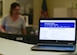 A laptop display that Air Force Aid Society link on the 316th Force Support Squadron's webpage sits on a desk at the Military and Family Readiness Center at Joint Base Andrews, Md., Aug. 4, 2022.