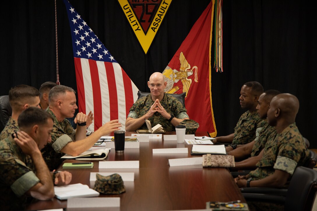 U.S. Marine Corps Sgt. Maj. Troy E. Black, the 19th Sergeant Major of the Marine Corps, meets with leaders from Marine Aircraft Group 29 and Marine Aircraft Group 26, 2nd Marine Aircraft Wing, on Marine Corps Air Station New River, North Carolina, July 27, 2022. Black met with MAG-26 and MAG-29 leaders to discuss retention, promotion, and the importance of a coordinated plan for future career path for Marines in deactivating squadrons. (U.S. Marine Corps photo by Lance Cpl. Joshua Crumback)