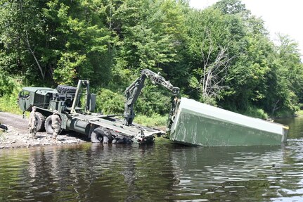 Army Reserve engineers building bridge, berms and trail during annual training at Fort Drum