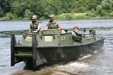 Army Reserve engineers building bridge, berms and trail during annual training at Fort Drum