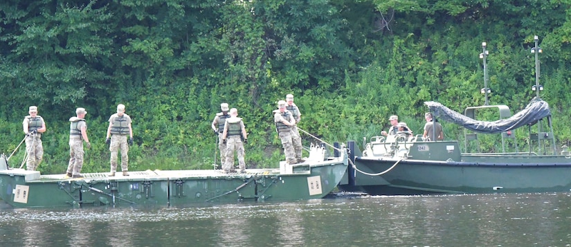 Army Reserve engineers building bridge, berms and trail during annual training at Fort Drum