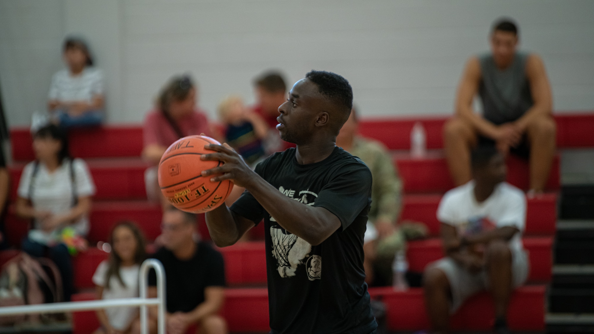 A person prepares to shoot a basketball