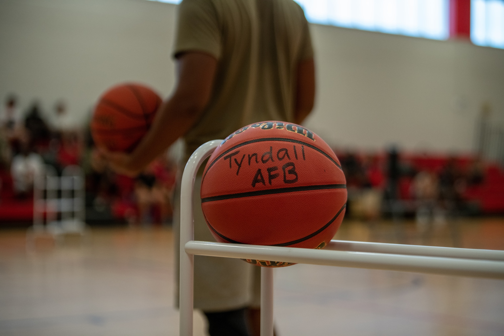 A basketball on a rack