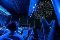 The U.S. Air Force Concert Band and the Singing Sergeants watch a fireworks show after a performance at an Independence Day fair at Mt. Vernon, Ill., July 4, 2022. 
The members of The Band and the United States Air Force Honor Guard share a common mission of representing the values of the Air Force and helping to foster a community across our nation and with our international allies. (U.S. Air Force photo by Airman Bill Guilliam)