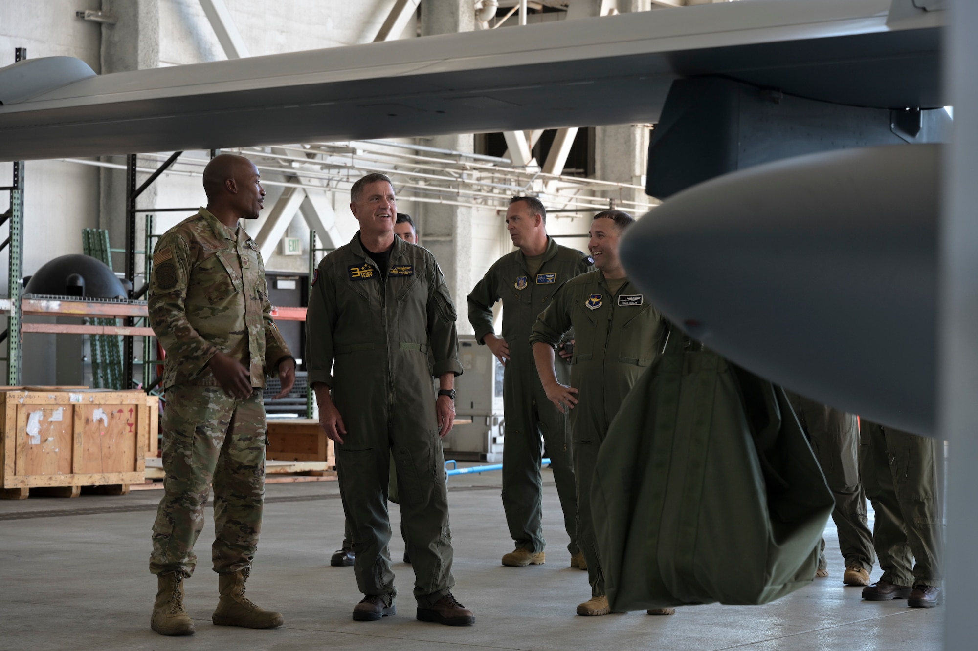 KANEOHE BAY, Hawaii (July 28, 2022) U.S. Air Force Master Sgt. Terrelle Thomas, 29th Aircraft Maintenance Squadron production superintendent, explains general MQ-9 Reaper specifications and maintenance procedures to U.S. Navy Vice Admiral Michael E. Boyle, Commander, 3rd Fleet, during Rim of the Pacific (RIMPAC) 2022, July 29, at  Marine Corps Air Station Kaneohe Bay, Hawaii.