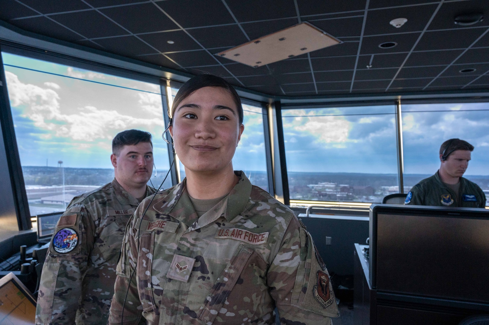 U.S. Air Force Airman 1st Class Lucienne Velghe, 509th Operations Support Squadron air traffic controller, overlooks the flight line April 7, 2022 on Whiteman Air Force Base, Mo. Air traffic controllers are responsible for controlling safe and orderly air traffic flow on the flight line and in the air. (U.S. Air Force photo by A1C Devan Halstead)