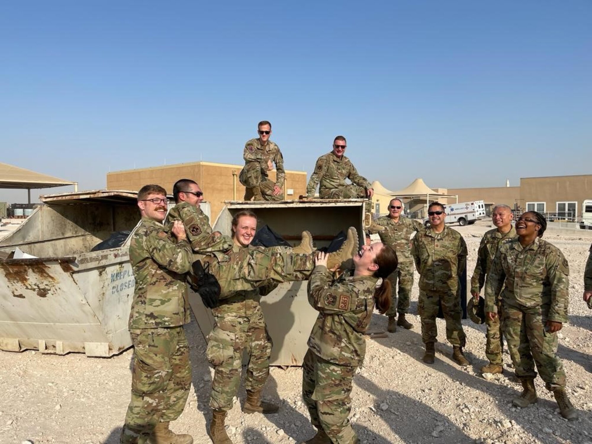 Members assigned to the 911th Aeromedical Staging Squadron gather at Al Udeid Air Base, Qatar, Sept. 7, 2021.