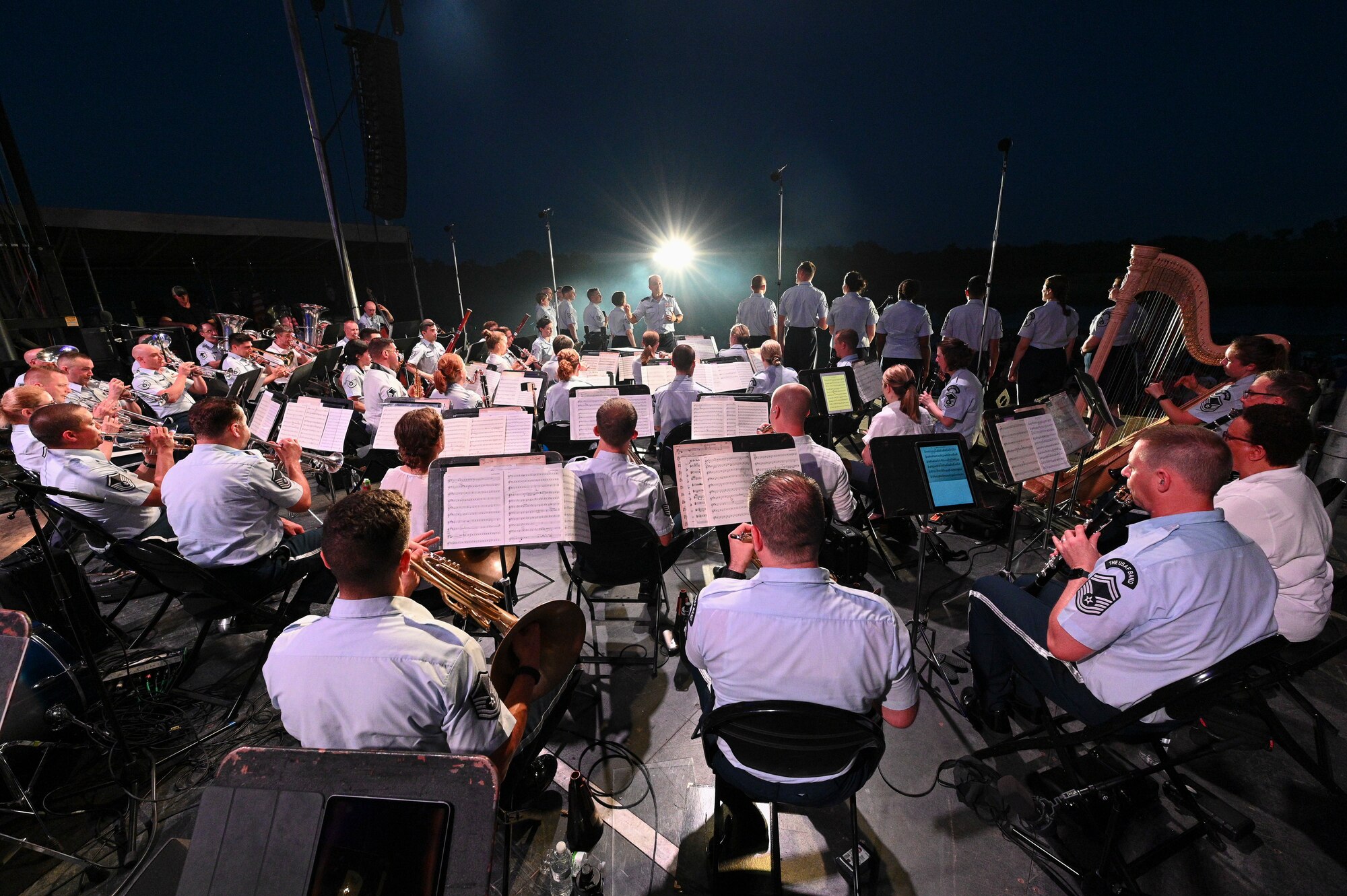 The U.S. Air Force Concert Band and the Singing Sergeants, perform at an Independence Day fair at Mt. Vernon, Ill., July 4, 2022. Using music to bridge language, cultural, societal and socio-economic differences, The Band's performances advance international relationships and inspire positive and long-lasting impressions of the U.S. Air Force and the U.S. (U.S. Air Force photo by Airman Bill Guilliam)
