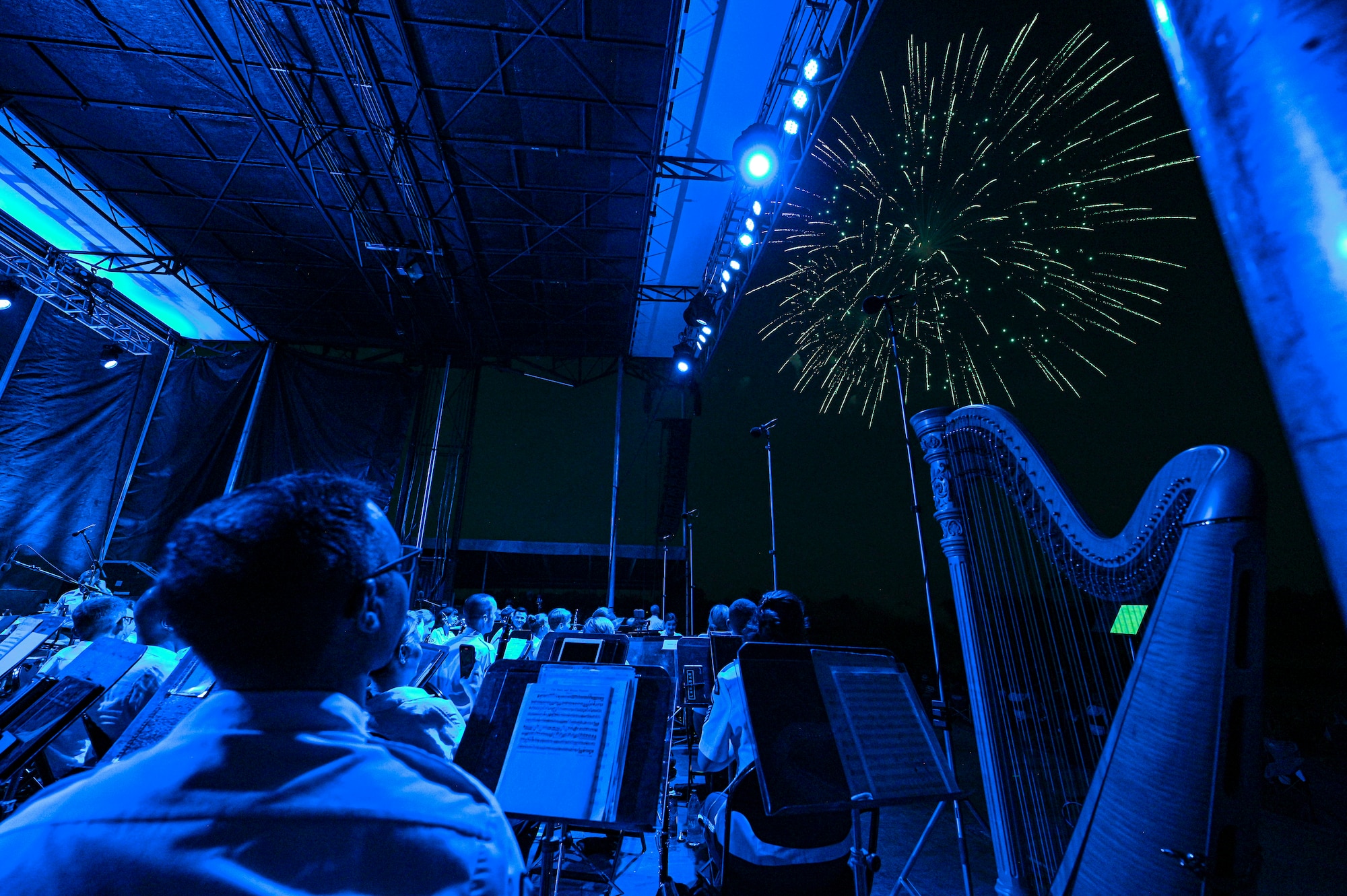 The U.S. Air Force Concert Band and the Singing Sergeants watch a fireworks show after a performance at an Independence Day fair at Mt. Vernon, Ill., July 4, 2022. 
The members of The Band and the United States Air Force Honor Guard share a common mission of representing the values of the Air Force and helping to foster a community across our nation and with our international allies. (U.S. Air Force photo by Airman Bill Guilliam)