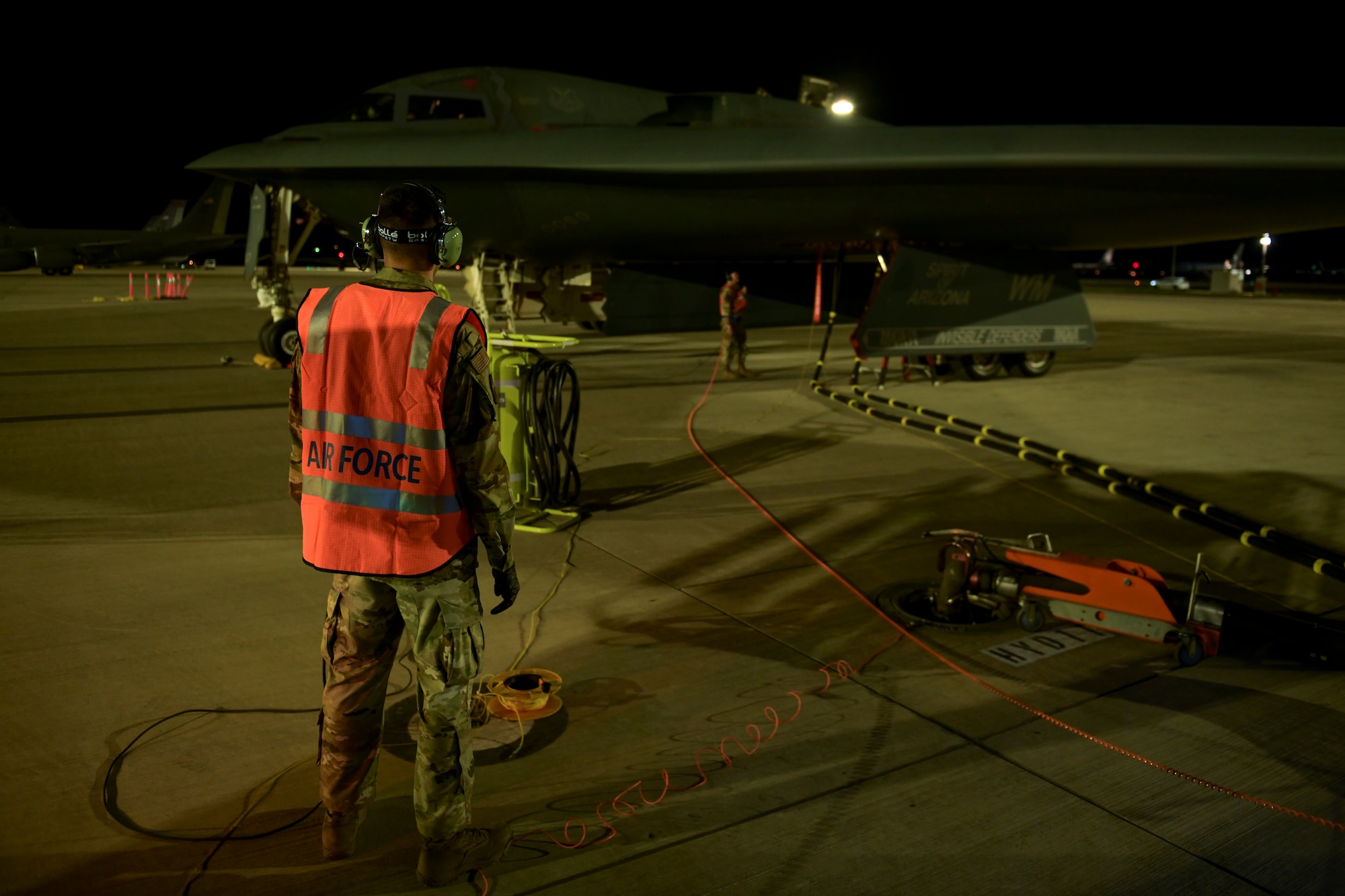 Team Whiteman Airmen perform hot pit refuel alongside RAAF Allies