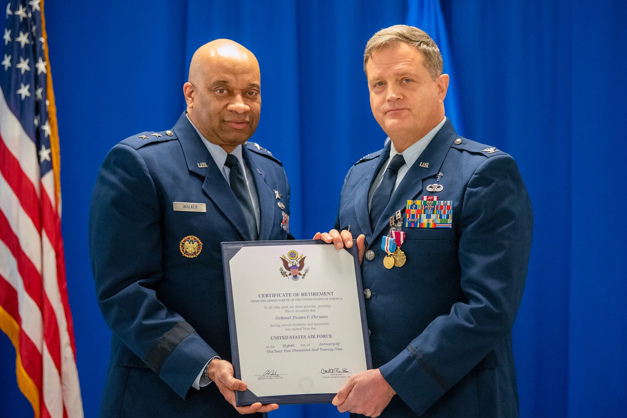 Col. Fred Ehrman, right, assistant to the command chaplain at United States Air Forces Europe and Air Forces Africa, receives his certificate of retirement from Maj. Gen. Charles Walker, director of the Office of Complex Investigations at the National Guard Bureau, during a ceremony at the Kentucky Air National Guard Base in Louisville, Ky., March 13, 2022. Ehrman served as a chaplain at the Kentucky Air National Guard’s 123rd Airlift Wing for 16 years. (U.S. Air National Guard photo by Phil Speck)