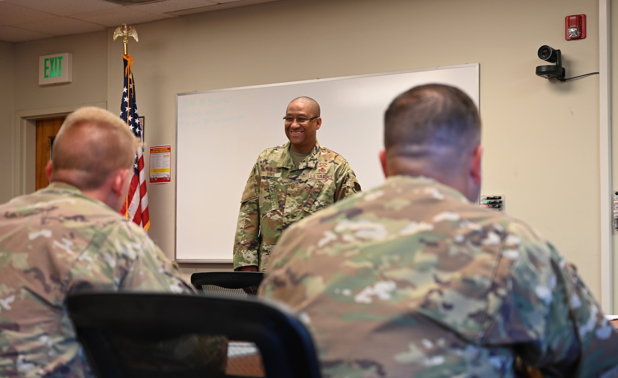 U.S. Air Force Chief Master Sgt. Anthony Sims, Maryland Air National Guard state command chief, speaks with Airmen at the Additional Duty First Sergeant's Course at Warfield Air National Guard Base at Martin State Airport in Middle River, Maryland, August 4, 2022. Chief Sims currently serves as the 12th Maryland Air National Guard state command chief and will assume the role of Maryland National Guard senior enlisted leader on August 15. (U.S. Air National Guard photo by Master Sgt. Chris Schepers)