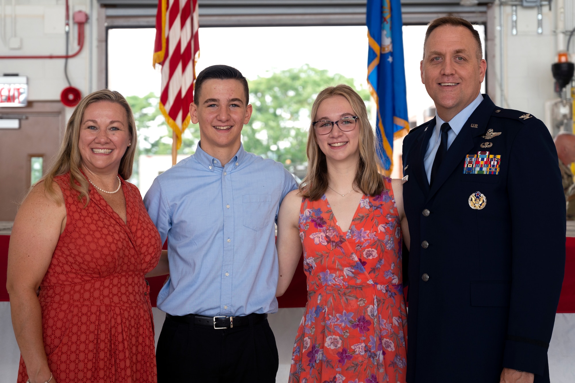 Col. Bryan M. Bailey, 911th Airlift Wing commander, poses for a photo with his family at the Pittsburgh International Airport Air Reserve Station, Pennsylvania, Aug. 7, 2022.