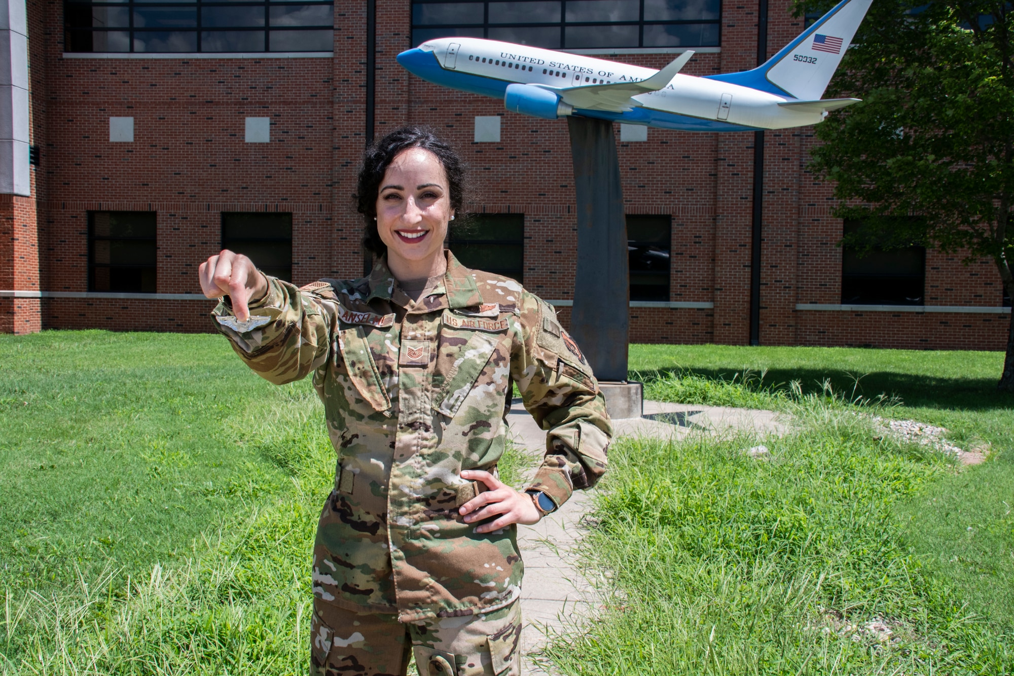 Tech. Sgt. Carola Anselmi, 73d Airlift Squadron flight attendant, poses for a photo at Scott Air Force Base, Ill., August 7, 2022. (U.S. Air Force photo by SSgt. Brooke Spenner)