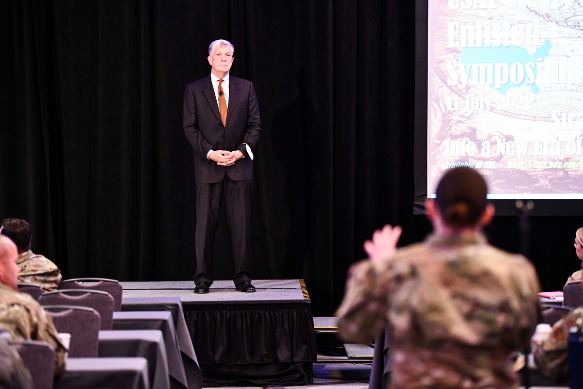 Dr. Thomas Lynch, Distinguished Reserach Fellow at the Center for Strategic Research at the National Defense University, Washington D.c., answers questions about current events in Ukraine from Senior Airman Viktoria Senkiv, a Ukrainian immigrant and member of the 910th Airlift Wing, Youngstown Ohio, during the Enlisted Symposium, July 11, 2022, in Washington, D.C. The symposium was created to provide Reserve Citizen Airmen with information from guest speakers and command leadership with the theme, "Building Tomorrow's Leaders Today: Compete, Deter, Win!"