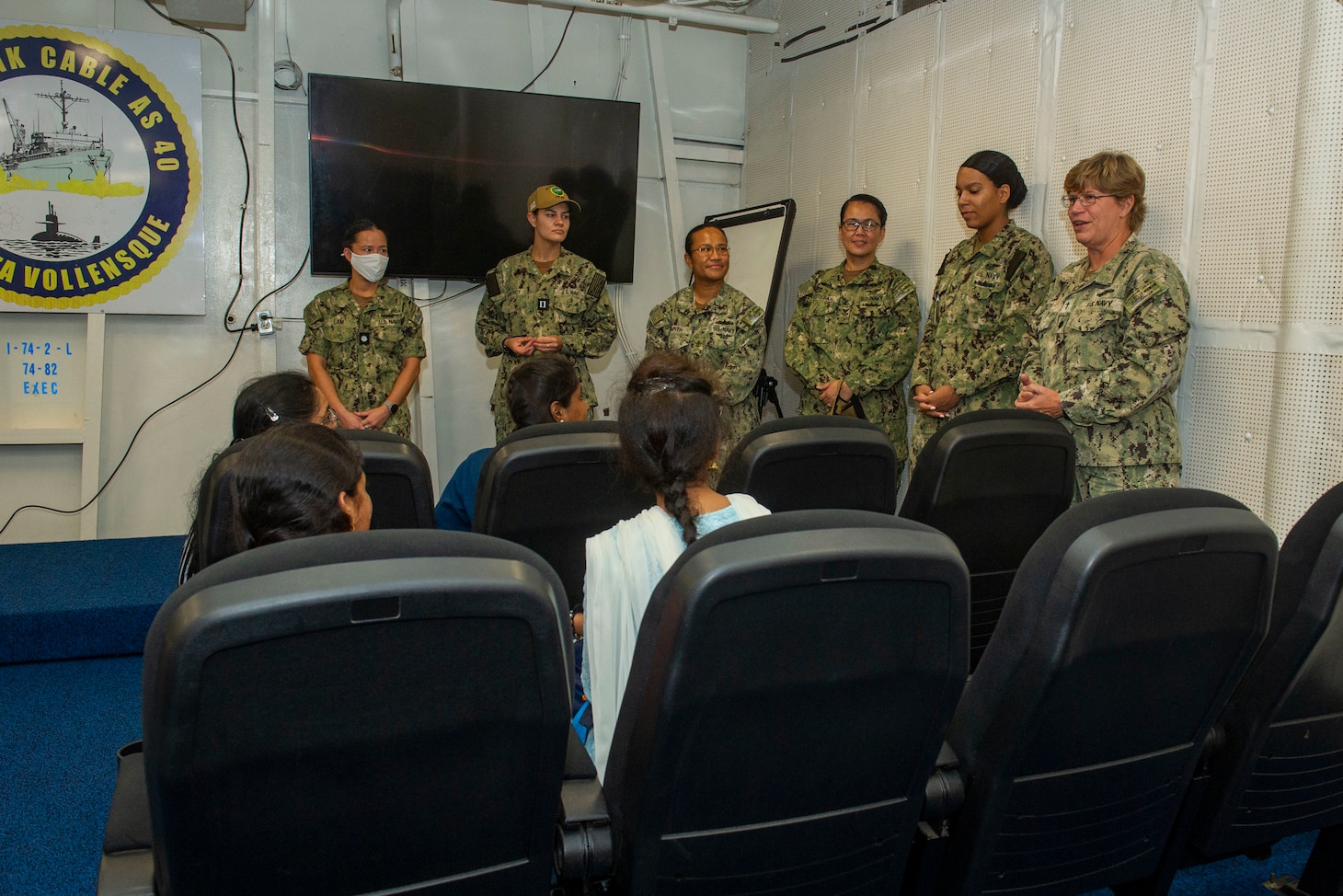 VISAKHAPATNAM, India (Aug. 2, 2022) – Sailors assigned to the Emory S. Land-class submarine tender USS Frank Cable (AS 40) speak with students from St. Joseph’s College for Women during a tour of the ship while moored in Visakhapatnam, India, Aug. 2, 2022. Frank Cable is currently on patrol conducting expeditionary maintenance and logistics in the 7th Fleet area of operations in support of a free and open Indo-Pacific. (U.S. Navy photo by Mass Communication Specialist 2nd Class Kaitlyn E. Eads)