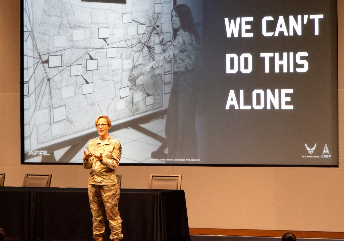 Air Force Research Laboratory Commander Maj. Gen. Heather Pringle explains the government-industry-academia partnership required to enable the Air Force to address rapidly evolving threats in the digital arena during the Dayton Digital Transformation Summit at Sinclair Community College in Dayton, Ohio, Aug. 2, 2022. The three-day event, held Aug. 2-4, educated the Dayton region and encouraged local and national parties to support Department of the Air Force digital transformation efforts. (U.S. Air Force photo / Kati Cospy)