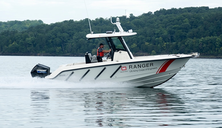Resource Manager Jonathan Friedman operates the lake staff’s new patrol boat on Lake Cumberland in Albany, Kentucky while patrolling Aug. 5, 2022. (USACE Photo by Lee Roberts)