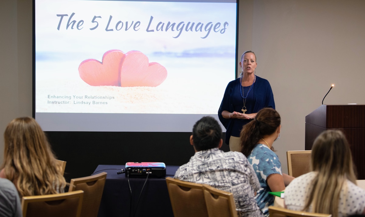 Master Sgt. Lindsay Barnes leads a discussion about the five love languages during a Yellow Ribbon event in Anaheim, California, July 30, 2022. The Yellow Ribbon Program connects Reserve Airmen and their loved ones with resources to help them before, during and after deployment. Barnes is a religious affairs specialist with the 4th Fighter Wing at Seymour Johnson Air Force Base, North Carolina. (U.S. Air Force photo by Senior Airman Brady Penn)