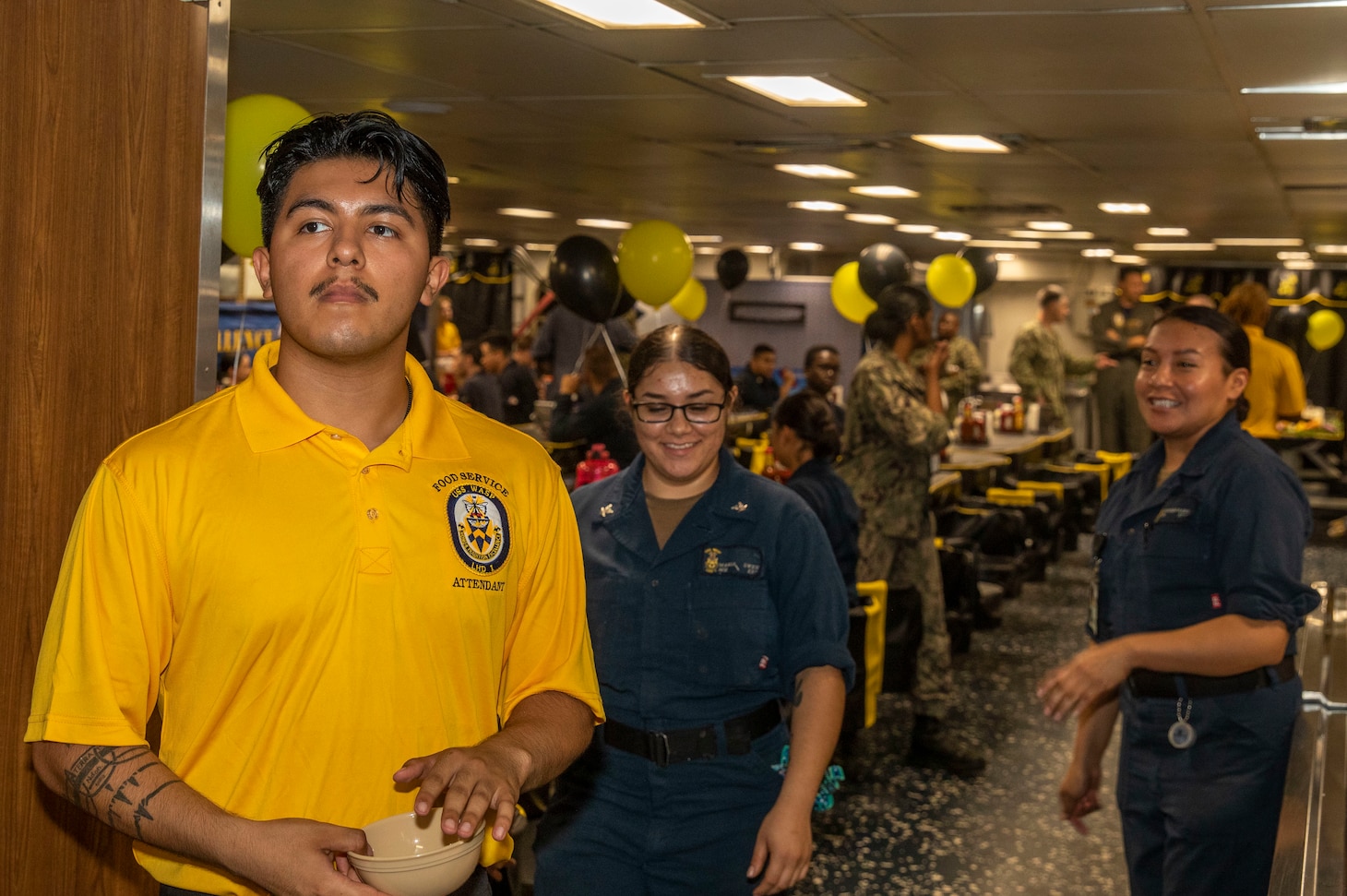 Sailor standing in mess decks