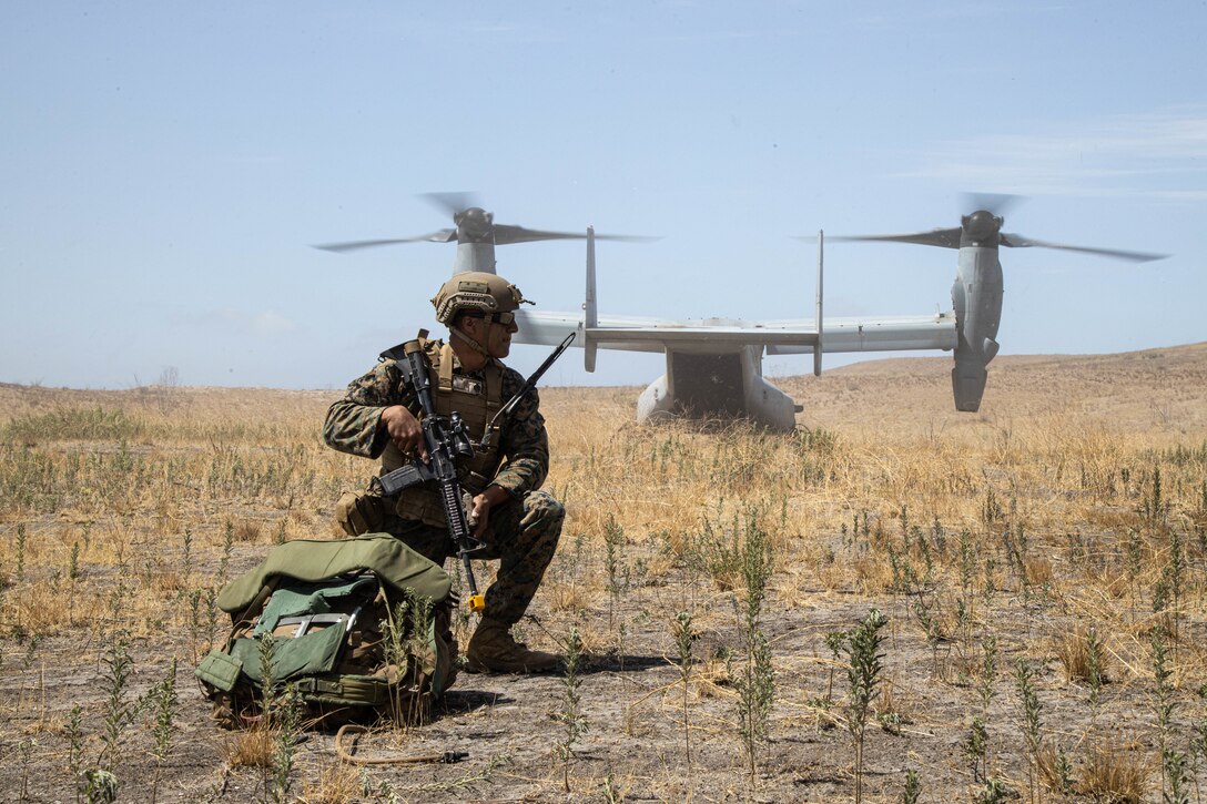 U.S. Marine platoon sergeant with India Company, 3rd Battalion, 5th Marine Regiment, 1st Marine Division, holds security during Readiness Exercise 22.2 at Marine Corps Base Camp Pendleton, California, July 26, 2022. The purpose of REDEX 22.2 is to validate worldwide crisis-response capabilities and demonstrate deployment readiness. (U.S. Marine Corps photo by Cpl. Harris)