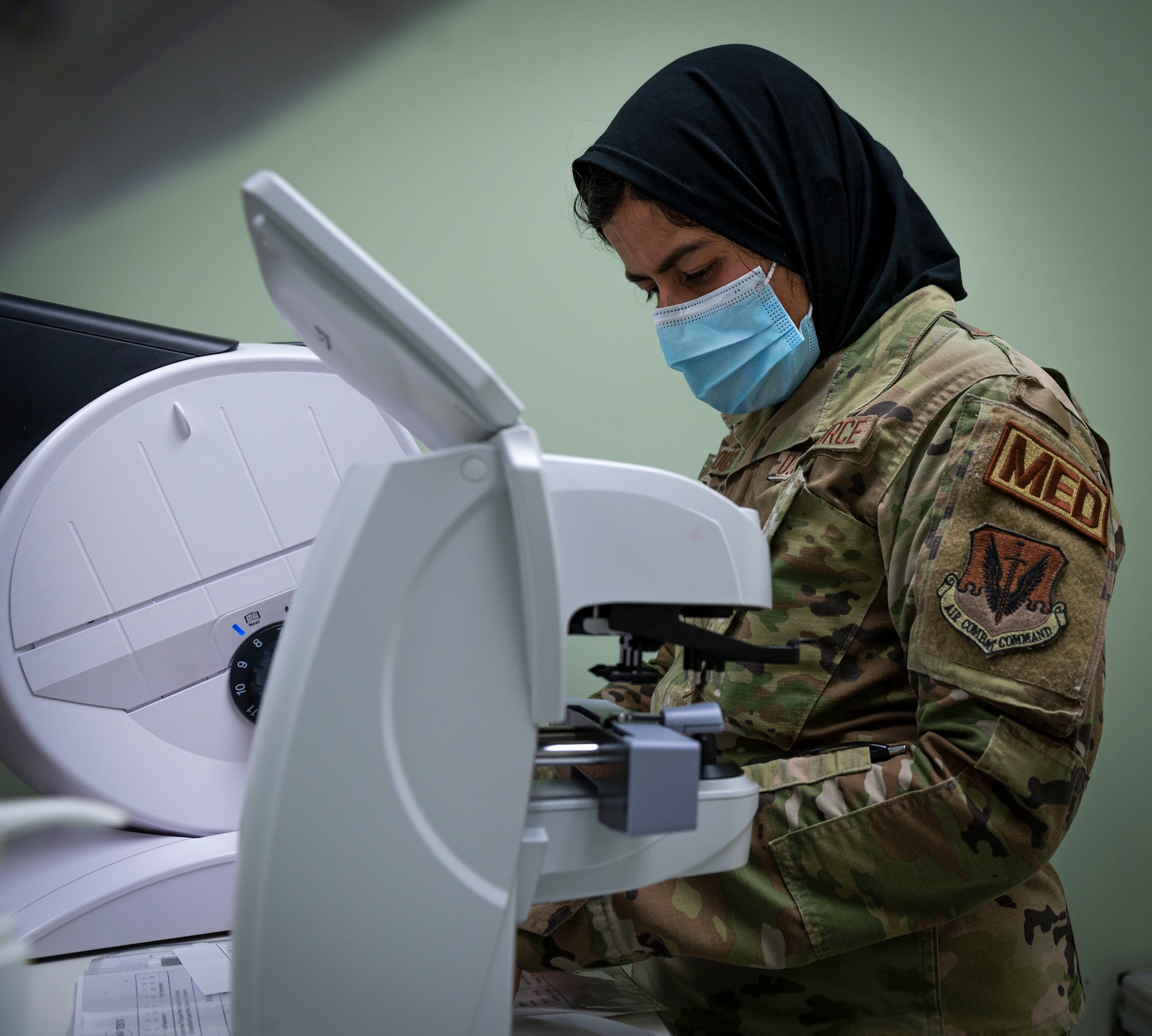 Airman 1st Class Noor Nargis-Ferdousy, 4th Operational Medical Readiness Squadron ophthalmic technician, measures the pressure of the fluids inside a patient's eyeball with a tonometer at Seymour Johnson Air Force Base, North Carolina, August 4, 2022. Originally from Dinajpur, Bangladesh, Nargis-Ferdousy was recognized as this week's Wingman Wednesday for her work ethic and dedication to her shop and community. (U.S. Air Force photo by Airman 1st Class Sabrina Fuller)