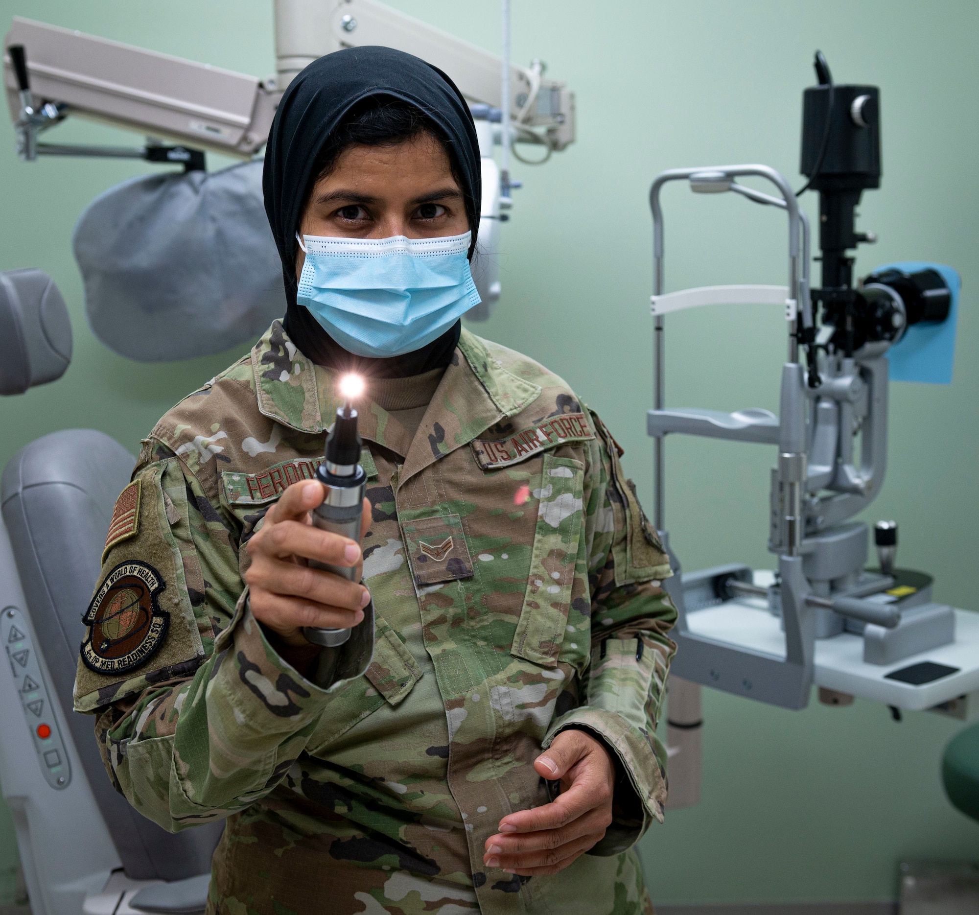 Airman 1st Class Noor Nargis-Ferdousy, 4th Operational Medical Readiness Squadron ophthalmic technician, poses for a picture at Seymour Johnson Air Force Base, North Carolina, August 4, 2022. Originally from Dinajpur, Bangladesh, Nargis-Ferdousy was recognized as this week's Wingman Wednesday for her work ethic and dedication to her shop and community. (U.S. Air Force photo by Airman 1st Class Sabrina Fuller)