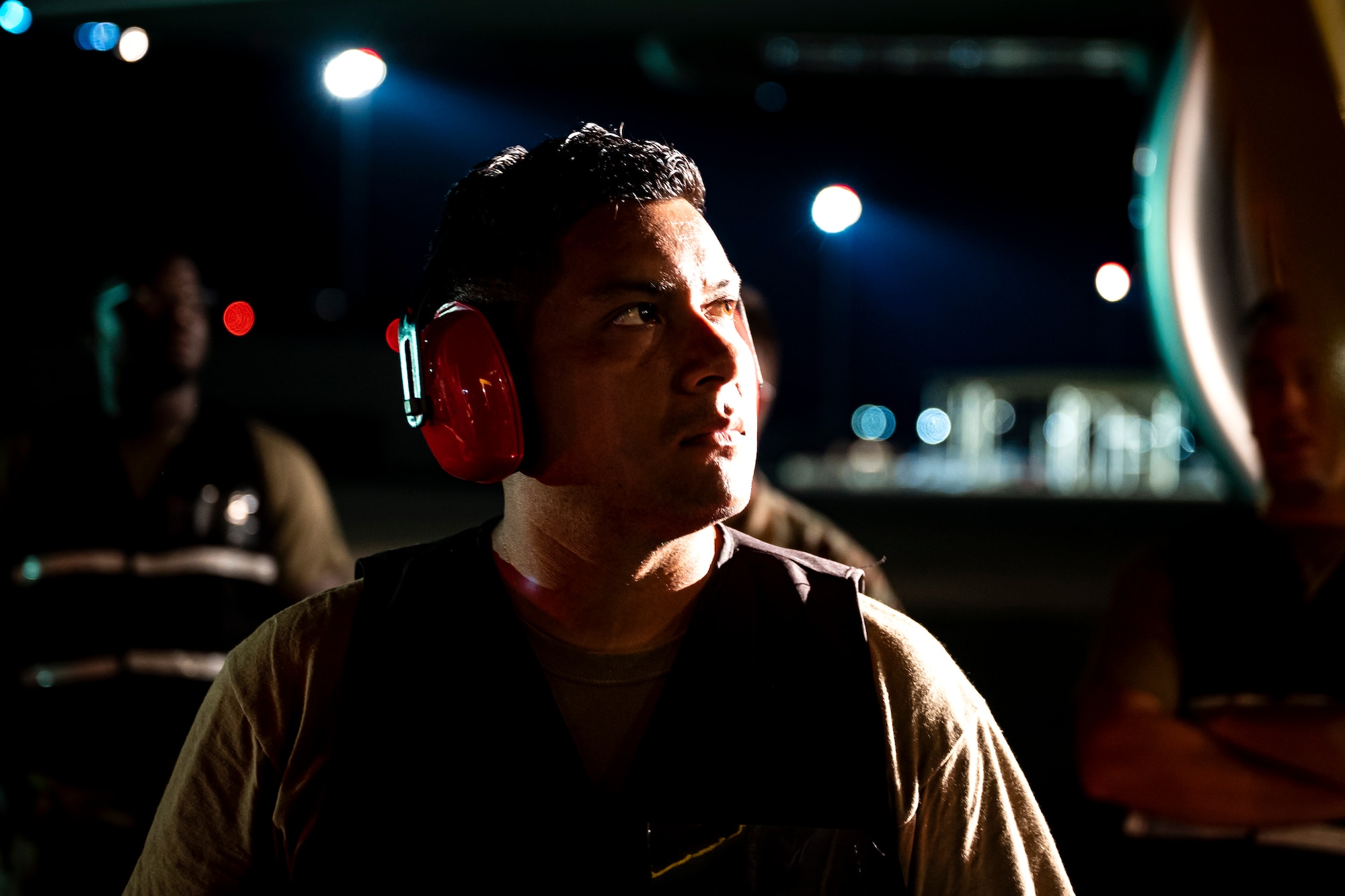 A Shaw AFB Airman supervises luggage loading