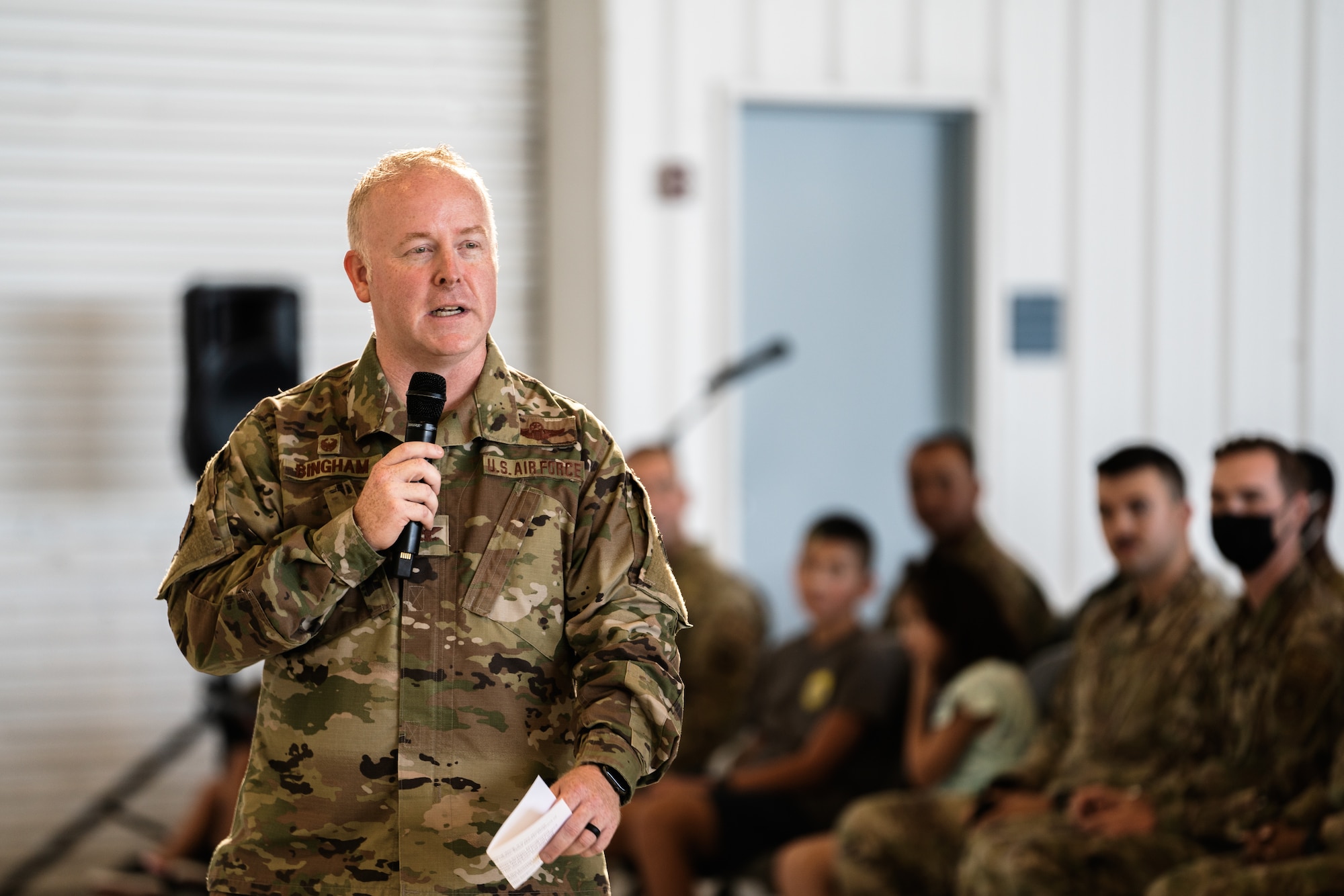 U.S. Air Force Col. Adam Bingham, 6th Air Refueling Wing commander, delivers opening remarks at a wing all-call at MacDill Air Force Base, Florida, Aug. 4, 2022.