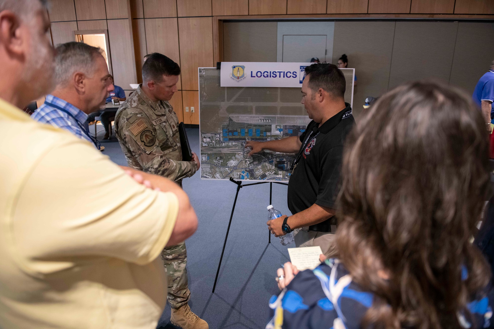 Airmen and civilians brainstorm for ideas.