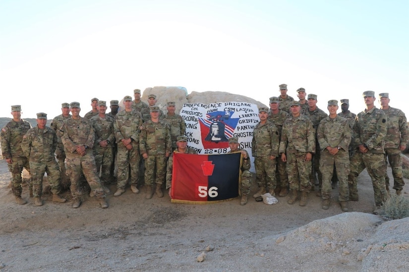 Command Group from the Independence Brigade pose for photo at “Painted Rocks,” with their newly painted 56 SBCT rock featuring the Liberty Bell along with the name of each participating Task Force. The 56 Stryker Brigade Combat Team, 28 Infantry Division, Pennsylvania Army National Guard recently completed their month long National Training Center rotation at Ft Irwin, Calif.