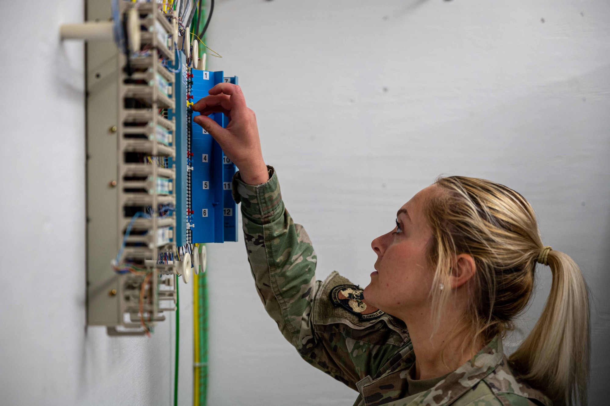 Airman 1st Class Alyssa Zydel, 436th Operation Support Squadron Radar Airfield and Weather System technician, operates a fuse switch at Dover Air Force Base, Delaware, April 28, 2022. The RAWS team provides Team Dover with maintenance for over 200 airfield, air traffic control and weather operations navigational aids as well as the supporting equipment. (U.S. Air Force photo by Senior Airman Faith Schaefer)