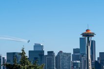 The U.S. Navy Flight Demonstration Squadron, the Blue Angels, fly over Seattle during Fleet Week, Aug. 5, 2022. Fleet Week Seattle is a time-honored celebration of the sea services and provides an opportunity for the citizens of Washington to meet Sailors, Marines and Coast Guardsmen, as well as witness firsthand the latest capabilities of today's maritime services. (U.S. Navy photo by Mass Communication Specialist 2nd Class Victoria Galbraith)