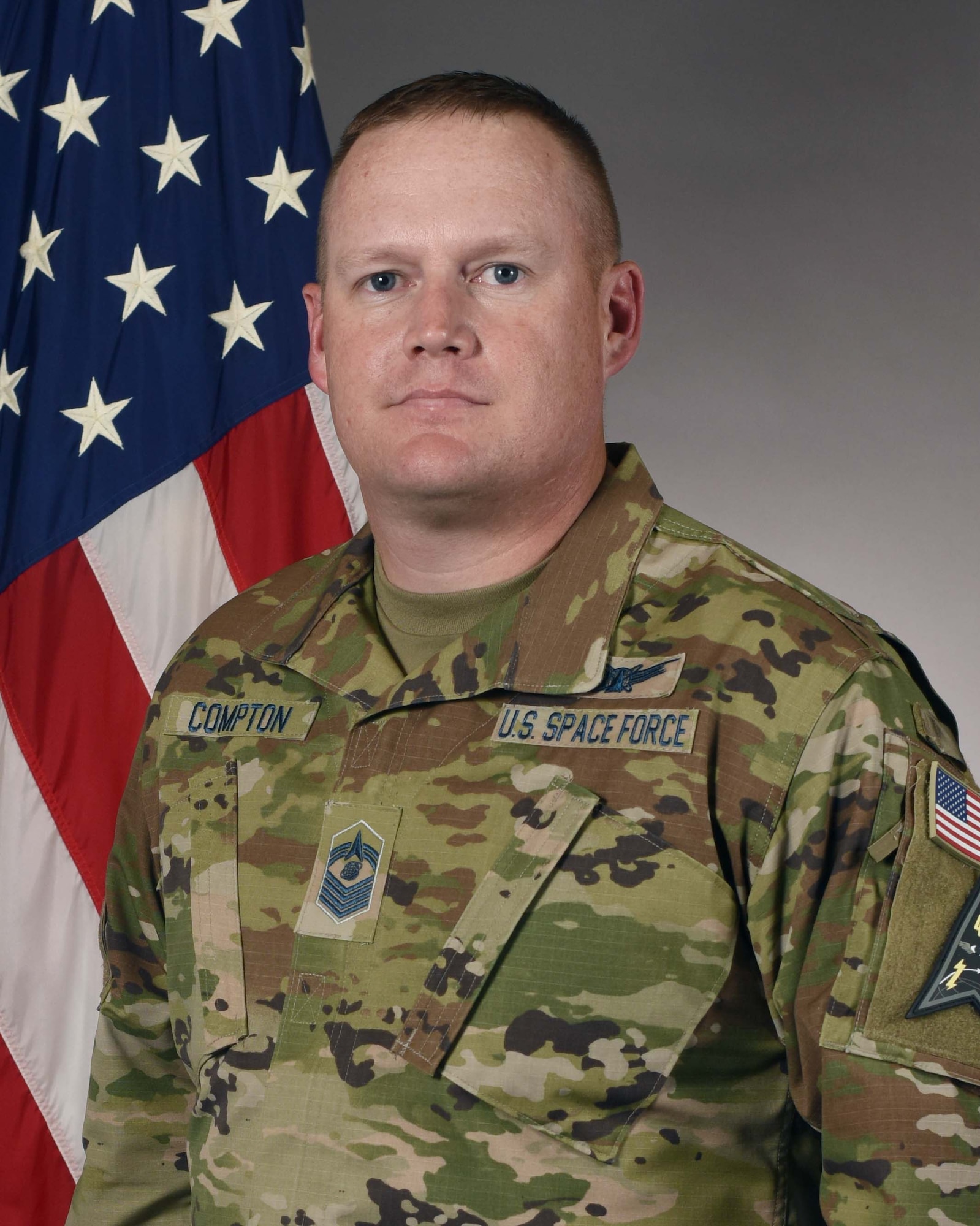 Military man poses in uniform for an official portrait photo
