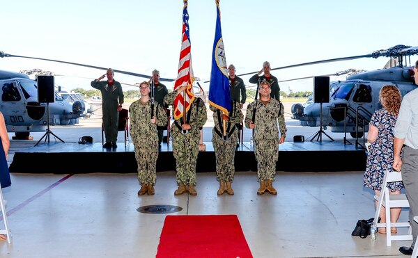 Sailors holding flags