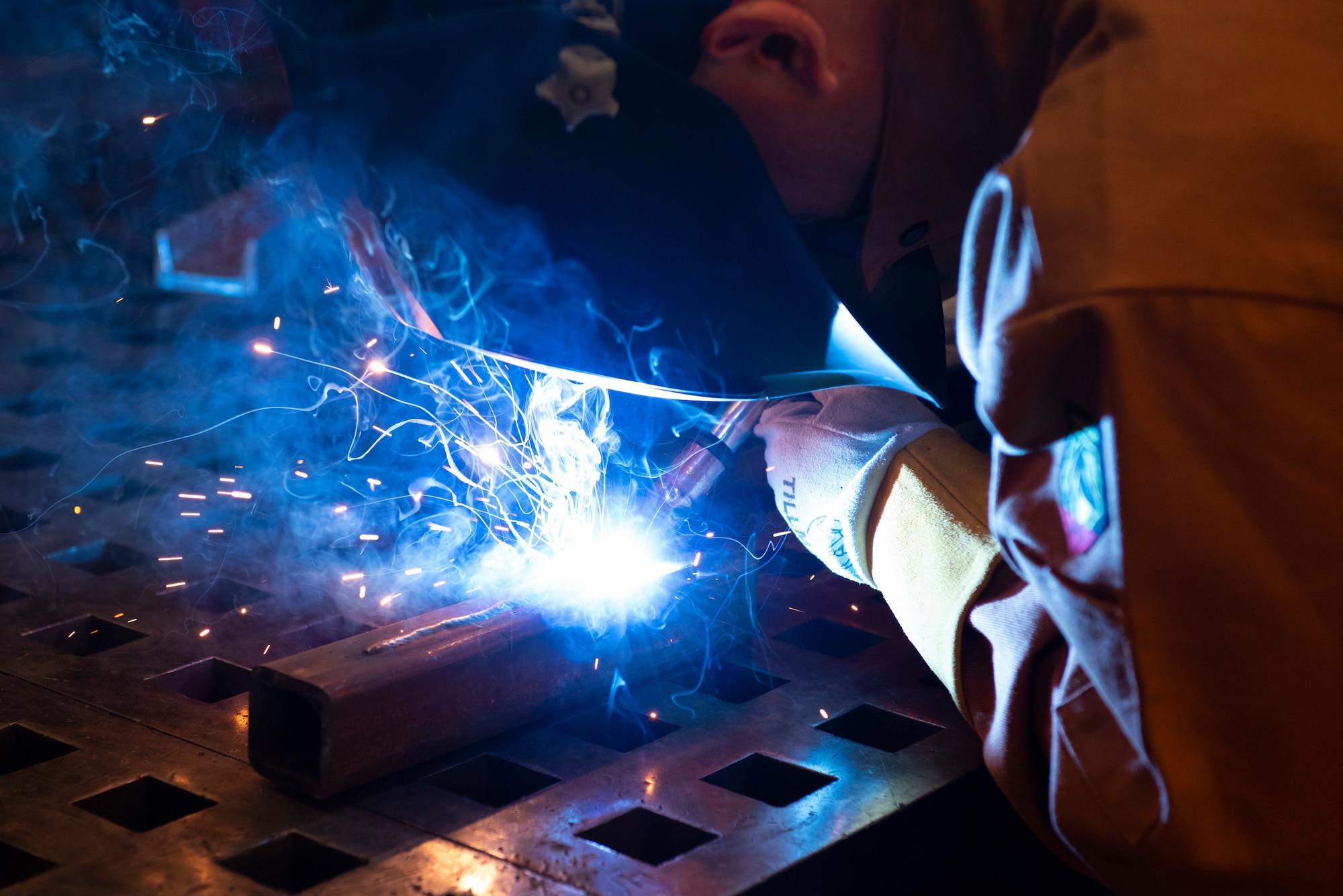 Airman 1st Class Devon Bento, 49th  Equipment Maintenance Squadron aircraft metals technology apprentice, practices a weld on a piece of metal on Holloman Air Force Base, New Mexico, July 20, 2022.