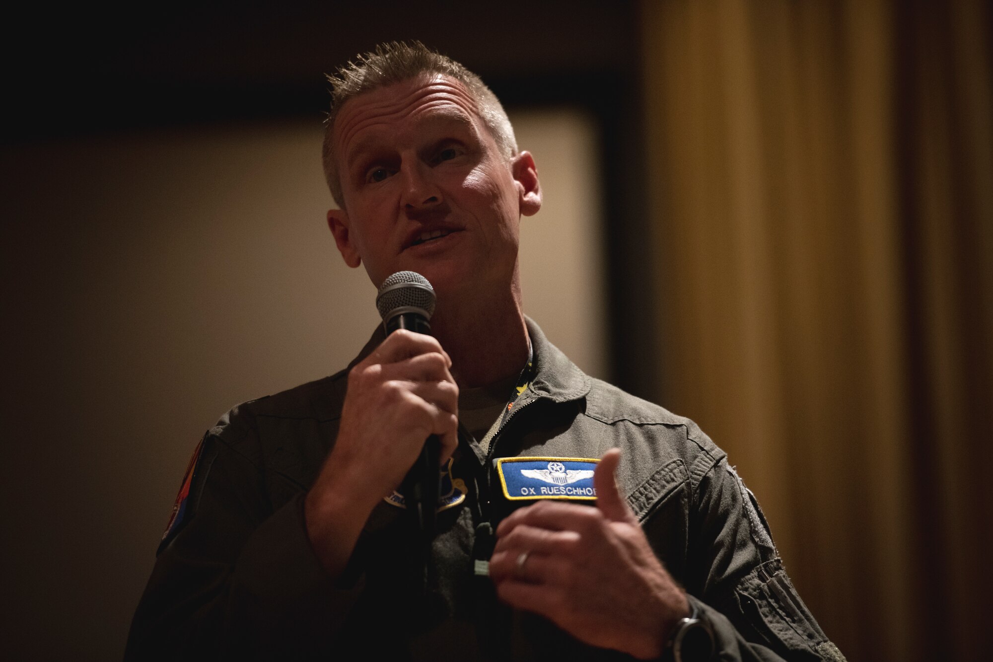 U.S. Air Force Brig. Gen. Jason M. Rueschhoff, 56th Fighter Wing commander, speaks to Airmen of the 56th FW, August 5, 2022, at Luke Air Force Base, Arizona.