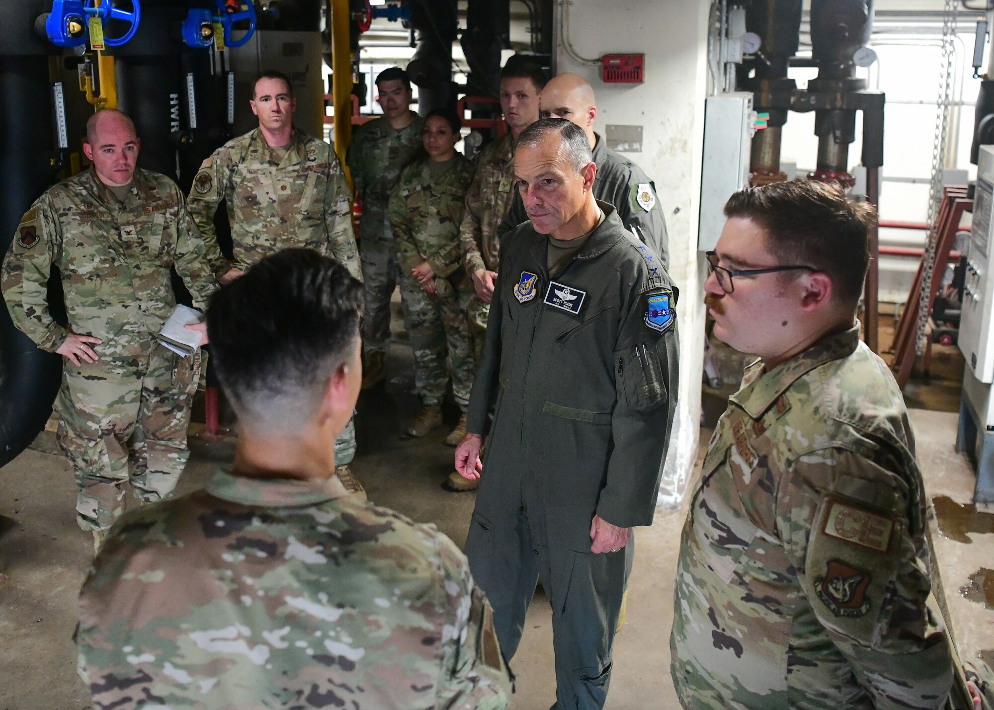 Military members conduct a briefing