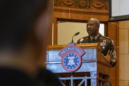 Command Sgt. Maj. Kenneth F. Law, U.S. Army Financial Management Command senior enlisted advisor, talks about the benefits of Army life to nearly 50 U.S. Army future Soldiers during a Future Soldier Recognition Event at the Indiana War Memorial in Indianapolis Aug. 5, 2022. The event included remarks from influential Army leaders, awards and recognition, and networking opportunities for future Soldiers waiting to ship out to basic combat training. (U.S. Army photo by Mark R. W. Orders-Woempner)