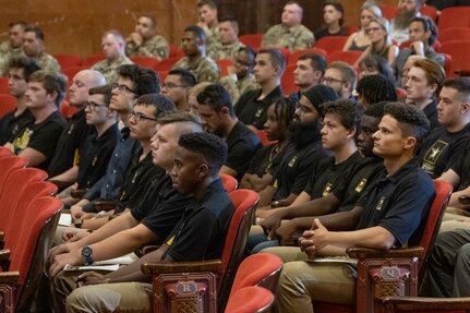 Future Soldiers listen during a Future Soldier Recognition Event at the Indiana War Memorial in Indianapolis Aug. 5, 2022. The event included remarks from influential Army leaders, awards and recognition, and networking opportunities for future Soldiers waiting to ship out to basic combat training. (U.S. Army photo by Mark R. W. Orders-Woempner)