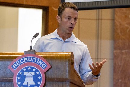 Brian Decker, Indianapolis Colts director of team development and former Special Forces Solider, talks about the benefits of Army life to nearly 50 U.S. Army future Soldiers during a Future Soldier Recognition Event at the Indiana War Memorial in Indianapolis Aug. 5, 2022. The event included remarks from influential Army leaders, awards and recognition, and networking opportunities for future Soldiers waiting to ship out to basic combat training. (U.S. Army photo by Mark R. W. Orders-Woempner)