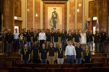 Nearly 50 U.S. Army future Soldiers pose with U.S. Army Soldiers and recruiters after a Future Soldier Recognition Event at the Indiana War Memorial in Indianapolis Aug. 5, 2022. The event included remarks from influential Army leaders, awards and recognition, and networking opportunities for future Soldiers waiting to ship out to basic combat training. (U.S. Army photo by Mark R. W. Orders-Woempner)