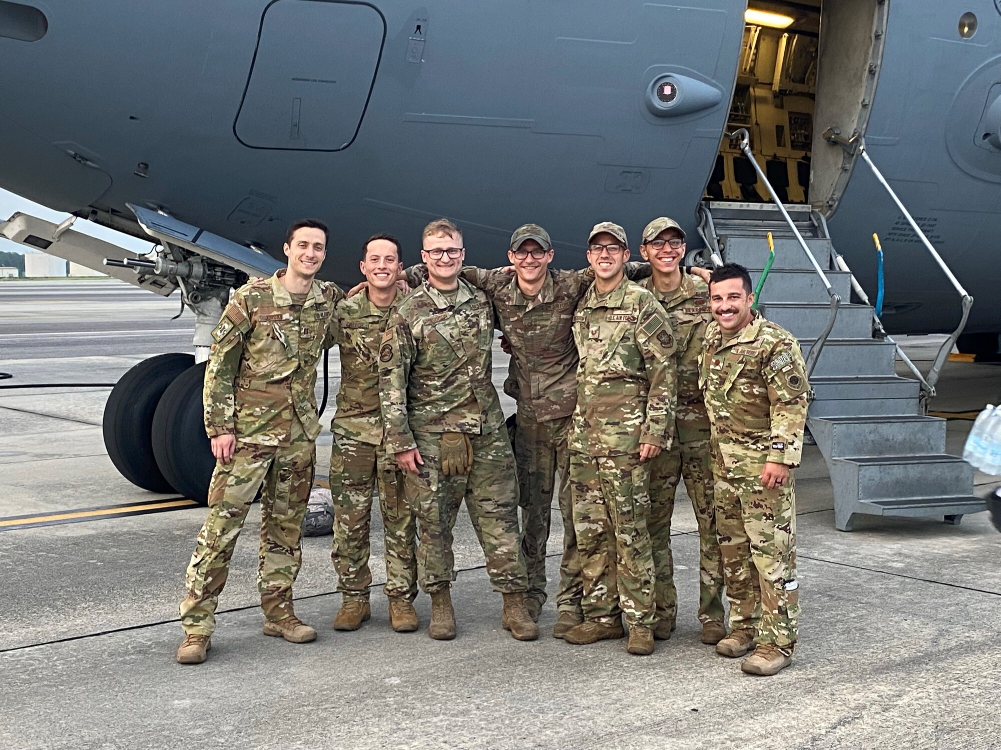 Aircrew from the 3rd Airlift Squadron pose for a group photo in front of a C-17 Globemaster III on Dover Air Force Base, Delaware. The aircrew received the Lt. Gen. William H. Tunner award for their efforts during Operation Allies Refuges in 2021. (U.S. Air Force courtesy photo)