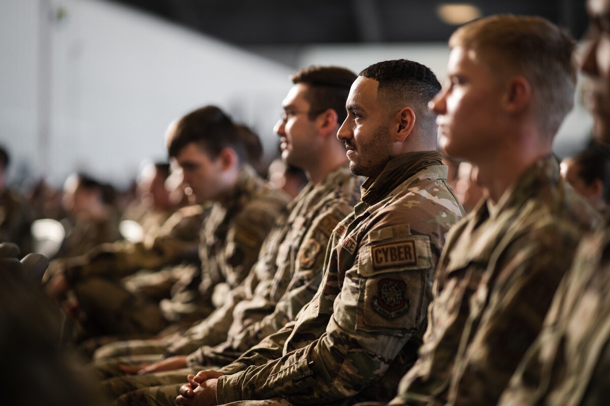 Airmen assigned to the 6th Air Refueling Wing listen to Chief Master Sgt. of the Air Force JoAnne S. Bass during an all-call at MacDill Air Force Base, Florida, Aug. 4, 2022.