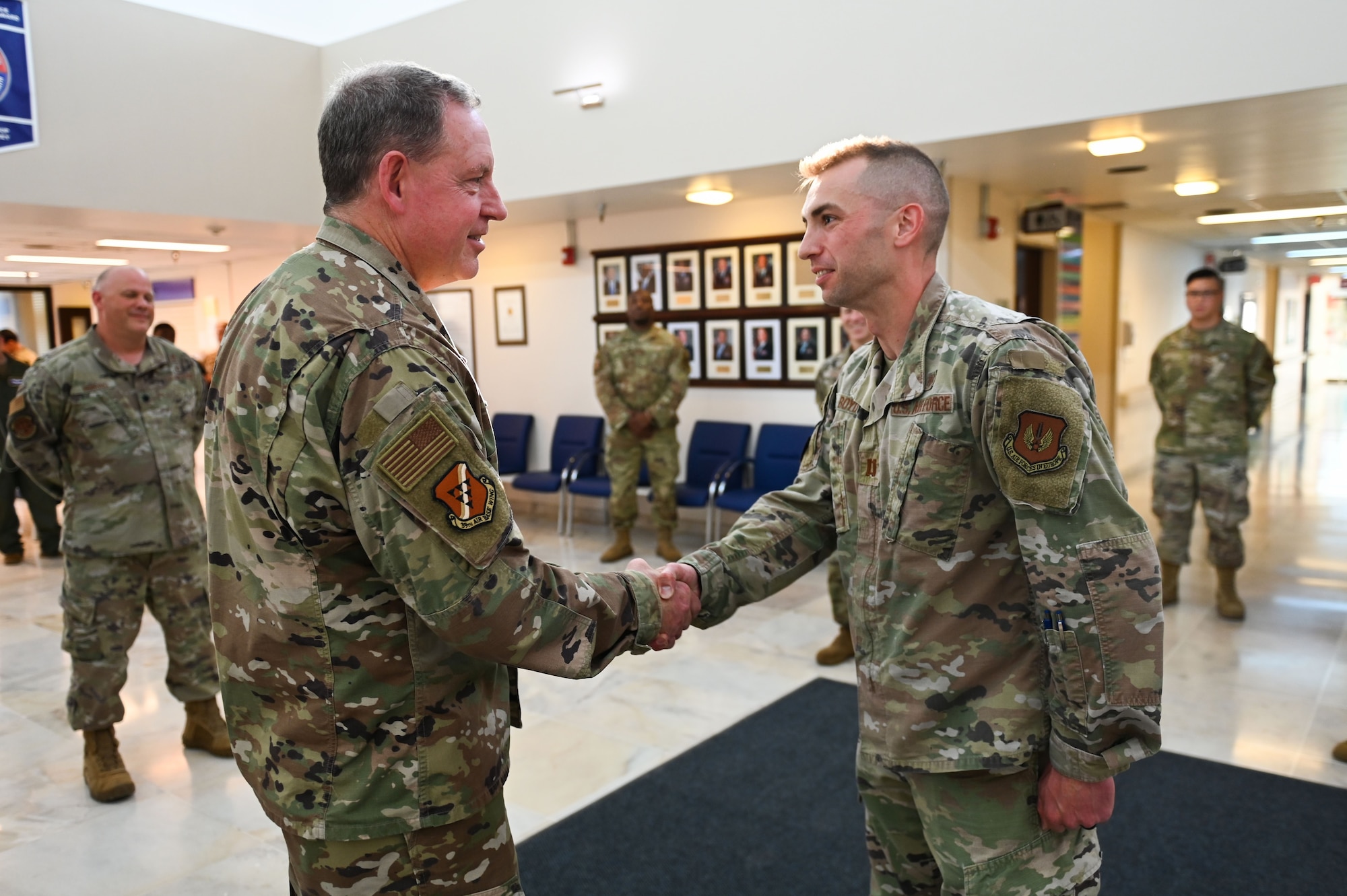 Gen. James B. Hecker, left, U.S. Air Forces in Europe and Air Forces Africa commander, coins Capt. Tyler Boyd, resource management office and medical information systems flight commander, during his visit to Incirlik Air Base, Turkey, Aug. 4, 2022. Hecker met with several Airmen and received briefings about the wing’s mission and capabilities while speaking with members about how their role supports the mission of USAFE-AFAFRICA. The wing takes deliberate actions to develop Airmen and their families; confronts global challenges in support of the National Defense Strategy to defend our country and our allies; and utilizes dedicated efforts to deliver peace to our nation and its allies by fostering stability and deterring aggression throughout Europe and Africa. (U.S. Air Force photo by Staff Sgt. Matthew Angulo)