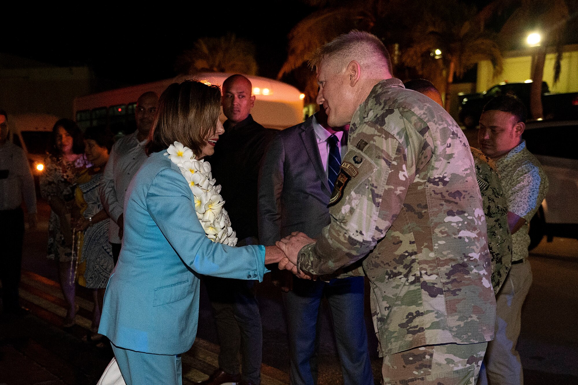 Speaker of the U.S. House of Representatives Nancy Pelosi is greeted by U.S. Air Force Brig. Gen. Paul Birch, 36th Wing commander, during a visit at Andersen Air Force Base, Guam, July 31, 2022. Pelosi visited Andersen AFB to focus on bilateral relationships, security cooperation and climate change. (U.S. Air Force photo by Staff Sgt. Suzie Plotnikov)
