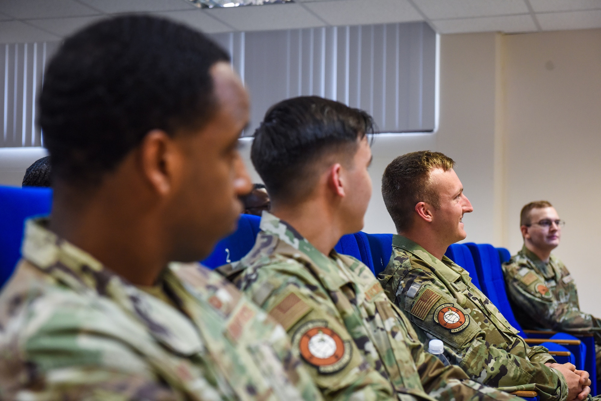 Airmen of the 39th Air Base Wing (ABW) attending Airman Leadership School (ALS) Class 22-F listen to Col. Kevin McCaskey, 39th ABW vice commander, lecture in the ALS classroom at Incirlik Air Base, Turkey, Aug. 8, 2022.